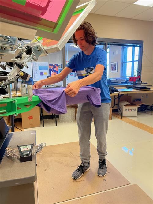 SHHS student screen printing shirt